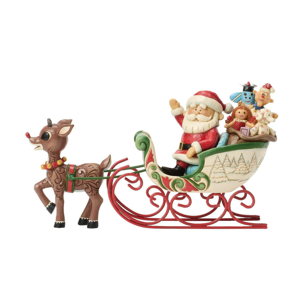 Rudolph Pulling Santa in Sleigh