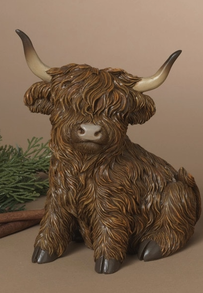 Sitting Highland Cow