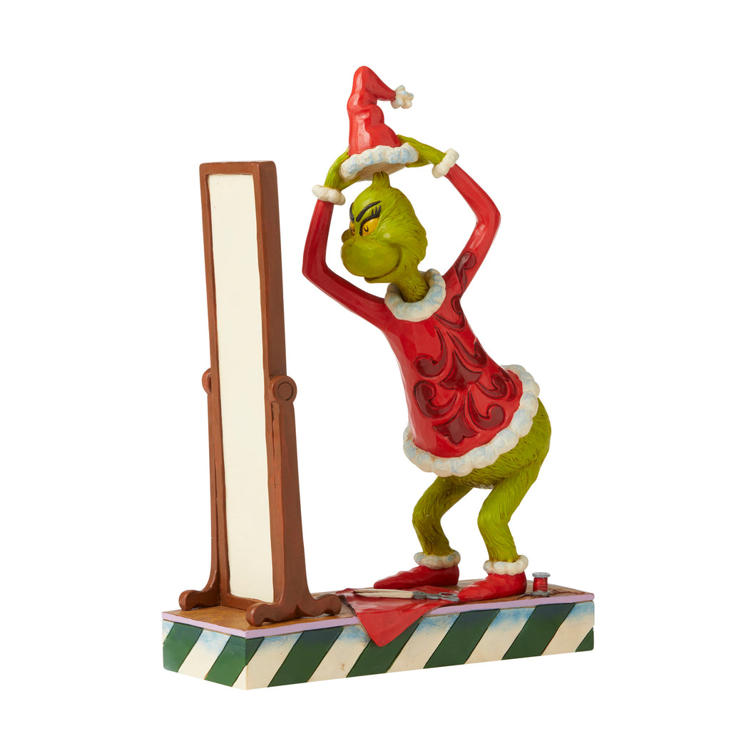 Grinch Dressing in Santa Suit